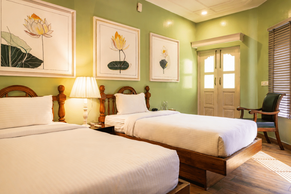 Luxury twin bed hotel room with wooden furniture